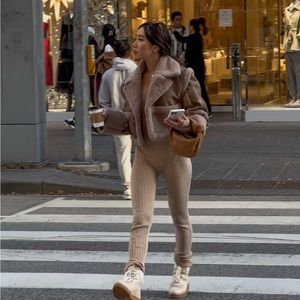 Maniere De Voir New condition cut out bodysuit size small. Brown